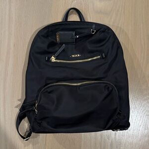 Tumi Black Backpack with Gold Zippers